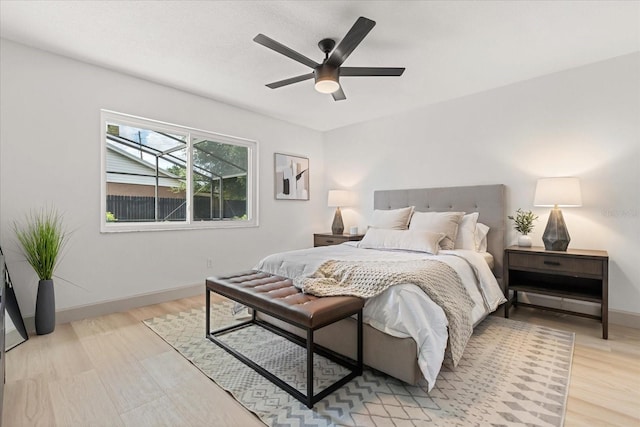 1030 Huntington Ct, Longwood, FL 32750 - bedroom with light wood-style flooring and ceiling fan
