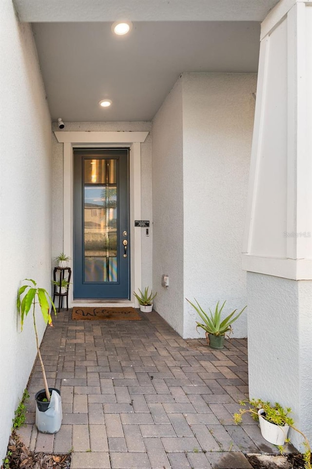 4316 Foggy Oak Ln, Sanford, FL 32773 - doorway to property with stucco siding