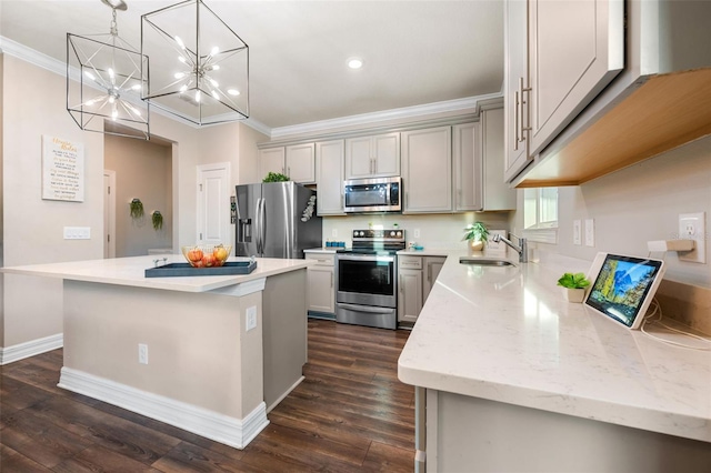 4316 Foggy Oak Ln, Sanford, FL 32773 - kitchen with stainless steel appliances, crown molding, gray cabinetry, a center island, and recessed lighting