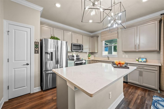 4316 Foggy Oak Ln, Sanford, FL 32773 - kitchen featuring appliances with stainless steel finishes, gray cabinetry, crown molding, dark wood-style flooring, and recessed lighting
