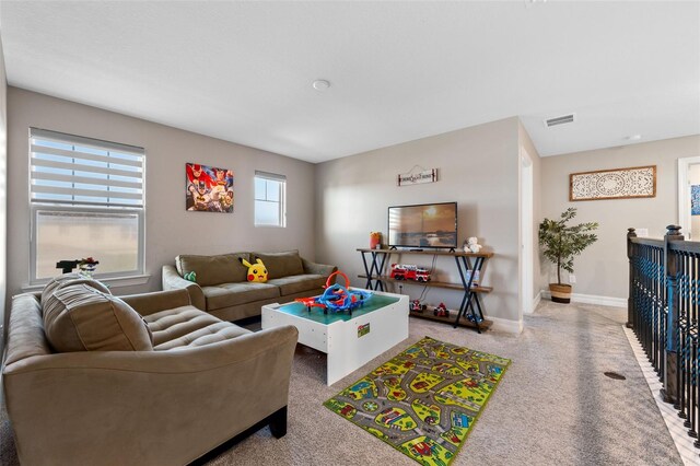 4316 Foggy Oak Ln, Sanford, FL 32773 - living area with light carpet and baseboards