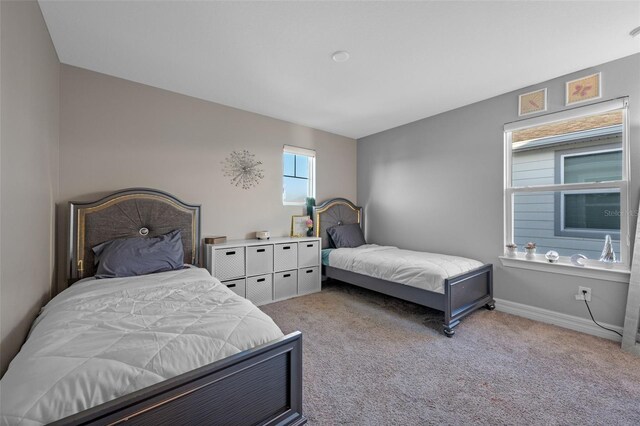 4316 Foggy Oak Ln, Sanford, FL 32773 - bedroom with light colored carpet and baseboards