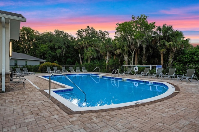 4316 Foggy Oak Ln, Sanford, FL 32773 - community pool featuring a patio and view of wooded area