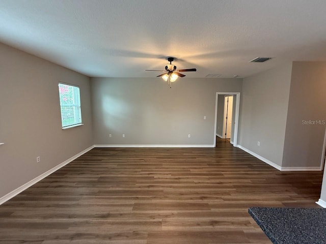 4792 Summerfield Cir, Winter Haven, FL 33881 - empty room featuring a ceiling fan, wood finished floors, and a textured ceiling