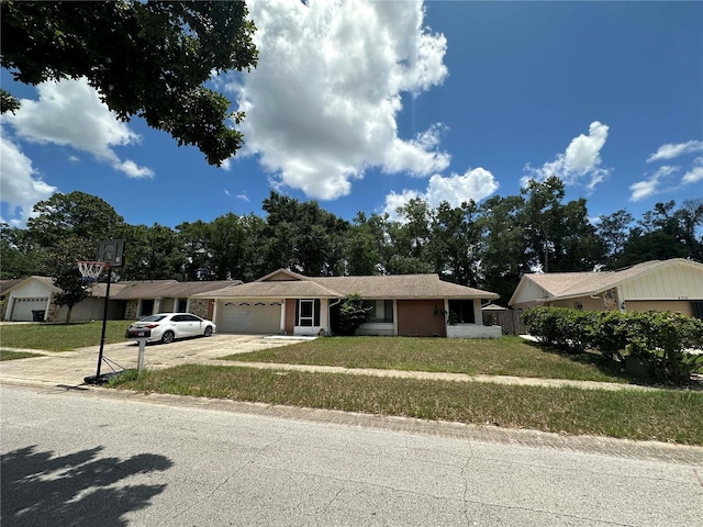 448 S Meander Dr, Altamonte Springs, FL 32714 - ranch-style home featuring an attached garage, a front yard, and driveway