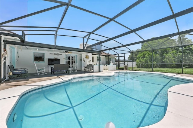 1515 Colonist Ct, Orlando, FL 32818 - outdoor pool with ceiling fan, a patio, and a lanai