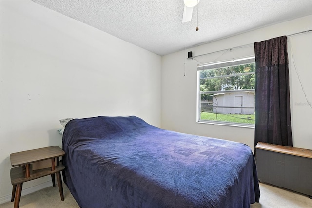 1515 Colonist Ct, Orlando, FL 32818 - bedroom with a textured ceiling and a ceiling fan