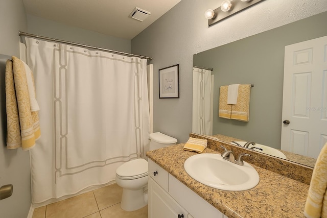 2550 Alafaya Trl Unit 9303, Orlando, FL 32826 - bathroom with vanity, tile patterned floors, and a shower with shower curtain