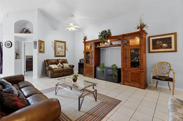 527 Durango Loop St, Davenport, FL 33897 - living area featuring light tile patterned flooring, a ceiling fan, and lofted ceiling