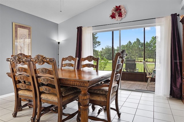 527 Durango Loop St, Davenport, FL 33897 - dining area with vaulted ceiling, healthy amount of natural light, and light tile patterned floors