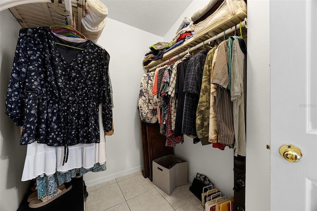 527 Durango Loop St, Davenport, FL 33897 - spacious closet featuring tile patterned floors