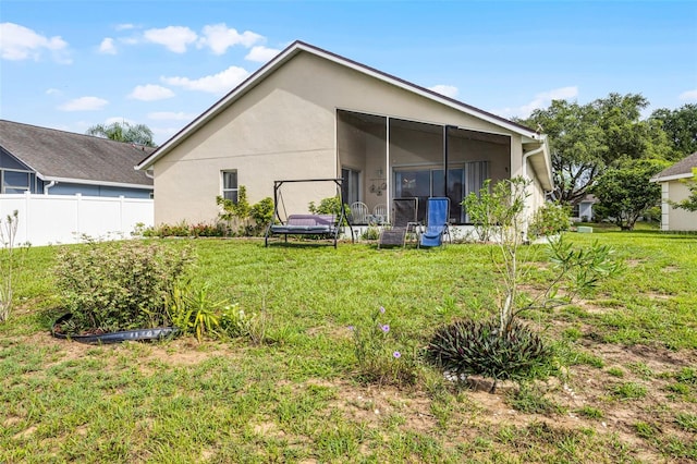 527 Durango Loop St, Davenport, FL 33897 - back of property with a sunroom and stucco siding