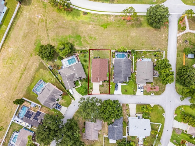 527 Durango Loop St, Davenport, FL 33897 - aerial overview of property's location featuring property parcel outlined and nearby suburban area