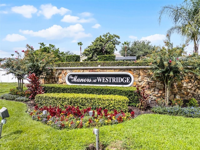 527 Durango Loop St, Davenport, FL 33897 - community sign featuring a lawn