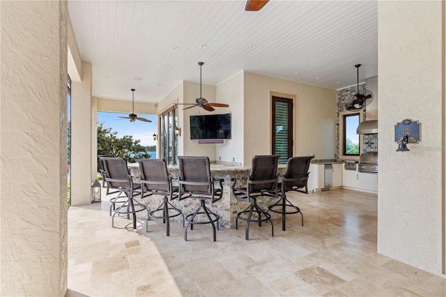 14315 80th Ave, Sebastian, FL 32958 - view of patio / terrace featuring exterior kitchen and ceiling fan