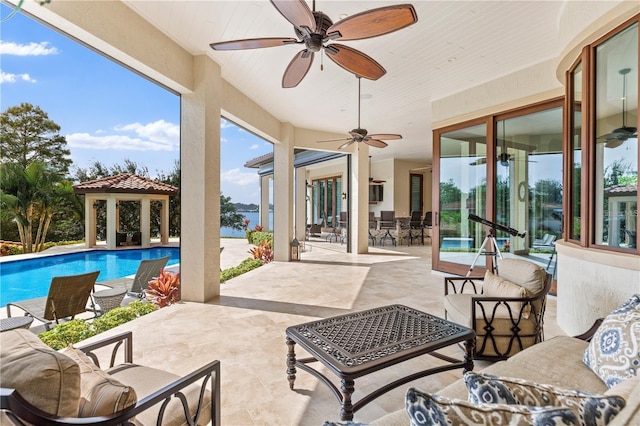 14315 80th Ave, Sebastian, FL 32958 - swimming pool featuring a gazebo, an outdoor hangout area, a ceiling fan, a patio, and outdoor dining space