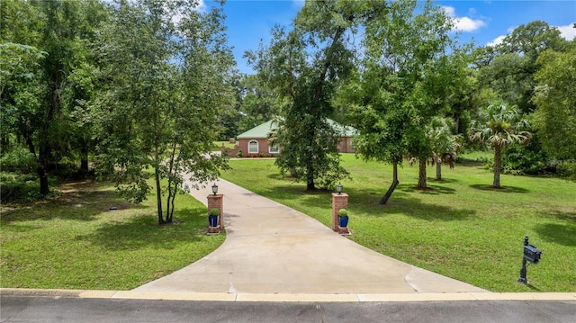 1908 S Farm Rd, Deland, FL 32720 - view of property's community featuring a yard and driveway