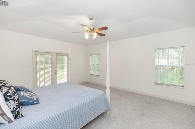 1908 S Farm Rd, Deland, FL 32720 - bedroom with carpet, access to outside, french doors, a ceiling fan, and lofted ceiling