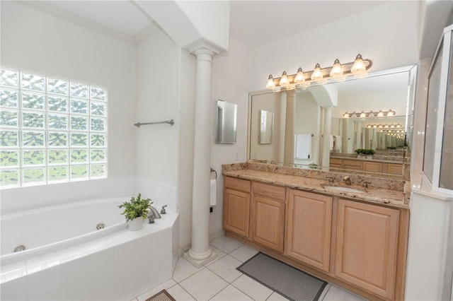 1908 S Farm Rd, Deland, FL 32720 - full bath with ornate columns, a whirlpool tub, vanity, and tile patterned flooring