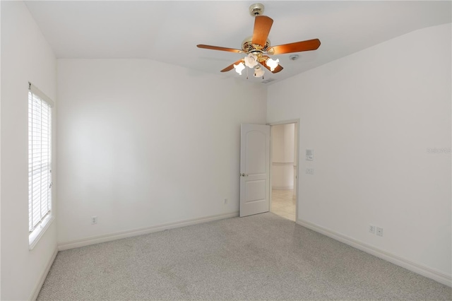 1908 S Farm Rd, Deland, FL 32720 - empty room featuring lofted ceiling, plenty of natural light, ceiling fan, and light colored carpet