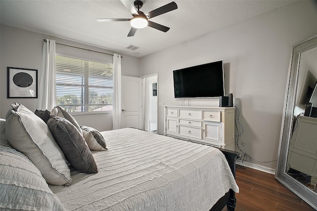 5116 Tempic Dr, Mount Dora, FL 32757 - bedroom featuring dark wood-style floors, ceiling fan, and a textured ceiling