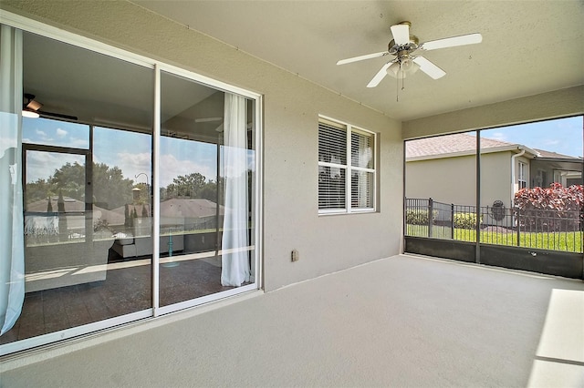 5116 Tempic Dr, Mount Dora, FL 32757 - unfurnished sunroom with a ceiling fan