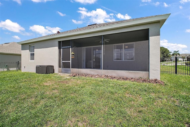 5116 Tempic Dr, Mount Dora, FL 32757 - rear view of property featuring a sunroom, stucco siding, and ceiling fan