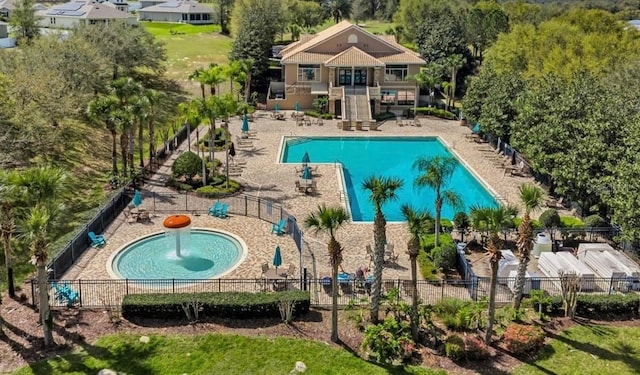 5116 Tempic Dr, Mount Dora, FL 32757 - community pool featuring stairway and a patio area