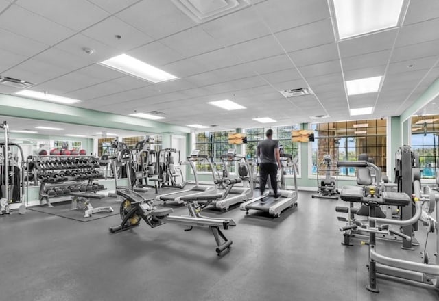 5116 Tempic Dr, Mount Dora, FL 32757 - exercise room with a drop ceiling