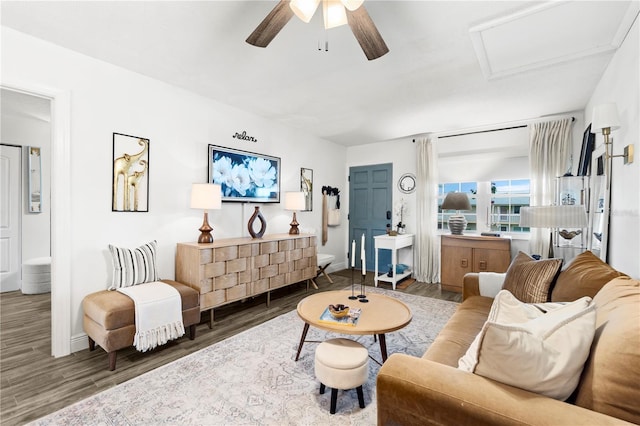 1100 E Caroline St Unit 204, Tavares, FL 32778 - living area with attic access, wood finished floors, and ceiling fan