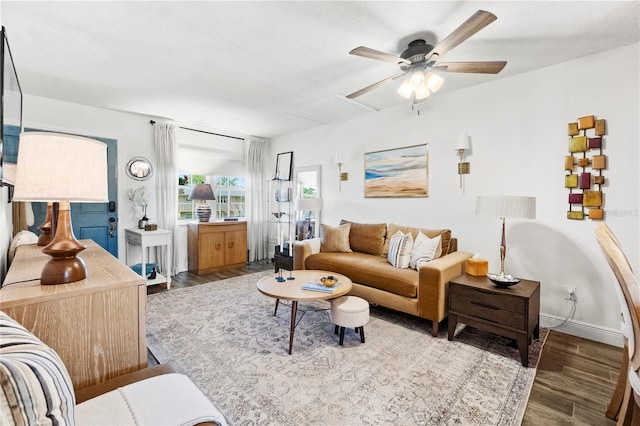 1100 E Caroline St Unit 204, Tavares, FL 32778 - living area with wood finished floors and a ceiling fan