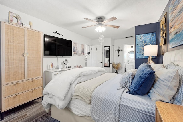 1100 E Caroline St Unit 204, Tavares, FL 32778 - bedroom with dark wood-style floors and ceiling fan