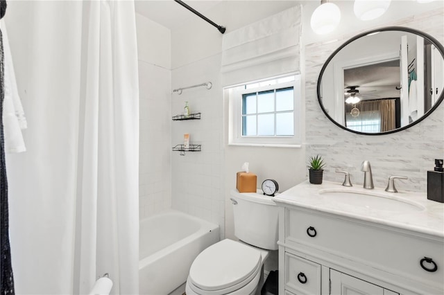 1100 E Caroline St Unit 204, Tavares, FL 32778 - bathroom with vanity, shower / bath combo with shower curtain, ceiling fan, and tasteful backsplash