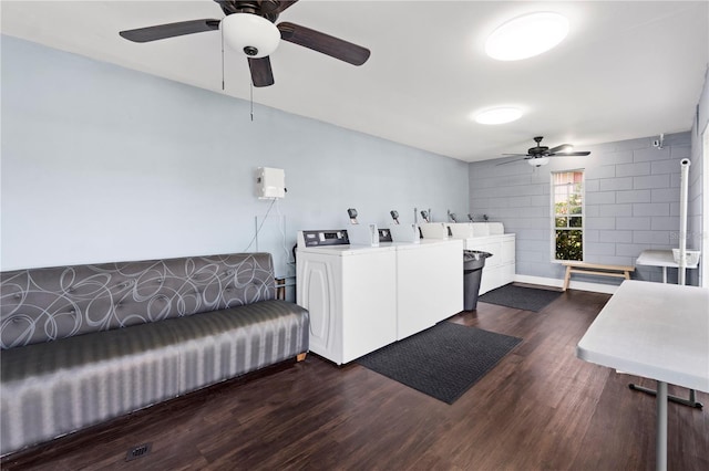1100 E Caroline St Unit 204, Tavares, FL 32778 - shared laundry room with washing machine and dryer, ceiling fan, and dark wood finished floors