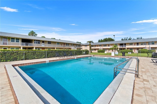 1100 E Caroline St Unit 204, Tavares, FL 32778 - community pool with a residential view