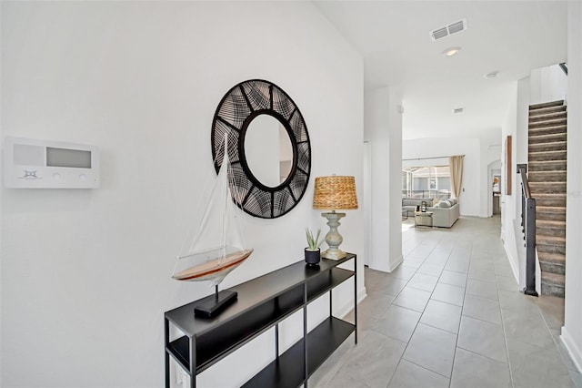 9175 Sommerset Hills Dr, Davenport, FL 33896 - hallway featuring stairway, light tile patterned floors, and recessed lighting
