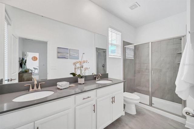 9175 Sommerset Hills Dr, Davenport, FL 33896 - bathroom featuring double vanity and a stall shower