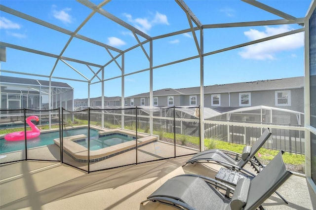 9175 Sommerset Hills Dr, Davenport, FL 33896 - view of pool featuring a patio, a residential view, glass enclosure, and a pool with connected hot tub