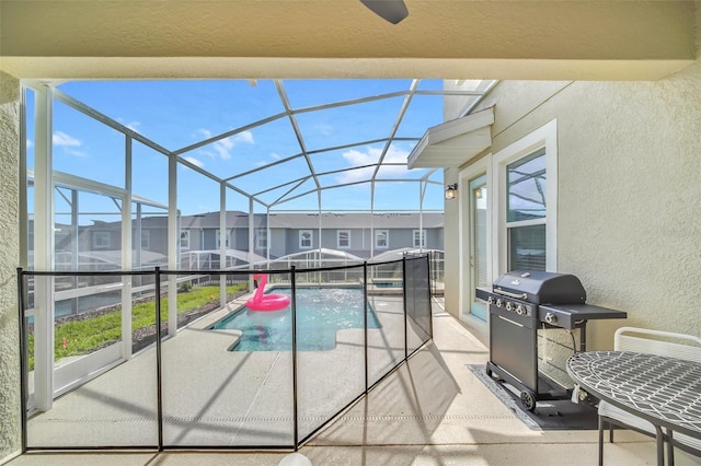 9175 Sommerset Hills Dr, Davenport, FL 33896 - swimming pool featuring grilling area, a patio, a lanai, and a residential view