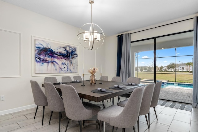 2907 Fable St, Kissimmee, FL 34746 - dining room with a chandelier and baseboards