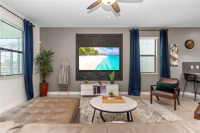 2907 Fable St, Kissimmee, FL 34746 - living area with ceiling fan and tile patterned flooring