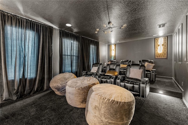 2907 Fable St, Kissimmee, FL 34746 - cinema room featuring carpet floors and a textured ceiling