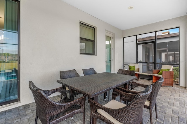 2907 Fable St, Kissimmee, FL 34746 - view of patio featuring outdoor dining area