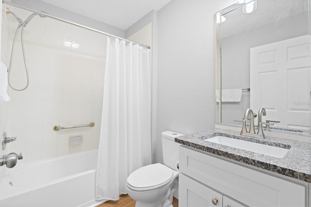 449 Timmonsville Way, The Villages, FL 32162 - full bathroom featuring vanity, shower / bath combo with shower curtain, and wood finished floors