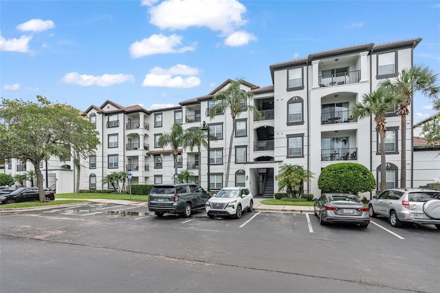 4114 Breakview Dr Unit 110, Orlando, FL 32819 - view of apartment building / complex with uncovered parking