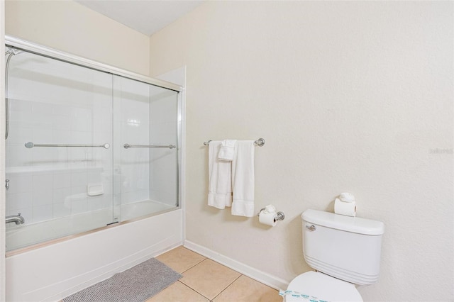 4114 Breakview Dr Unit 110, Orlando, FL 32819 - bathroom with tile patterned floors and shower / bath combination with glass door
