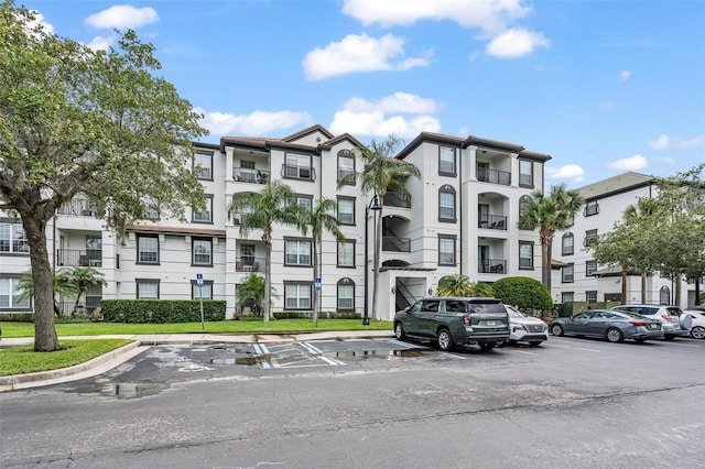 4114 Breakview Dr Unit 110, Orlando, FL 32819 - view of apartment building / complex featuring uncovered parking