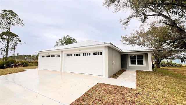 4413 Grass Ave, Sebring, FL 33875 - ranch-style home featuring a garage, concrete driveway, stucco siding, and a metal roof