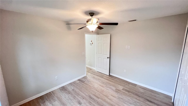 4413 Grass Ave, Sebring, FL 33875 - empty room featuring ceiling fan and light wood-type flooring