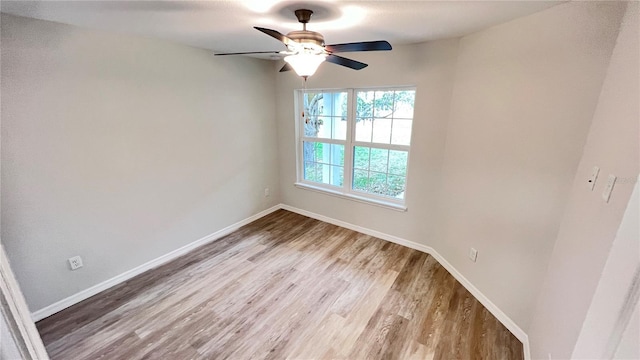 4413 Grass Ave, Sebring, FL 33875 - unfurnished room featuring light wood finished floors and a ceiling fan